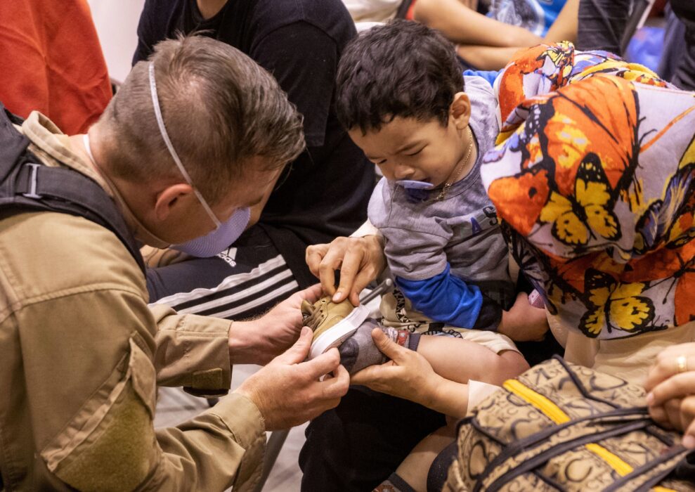 Emergency Worker Helping Civilians